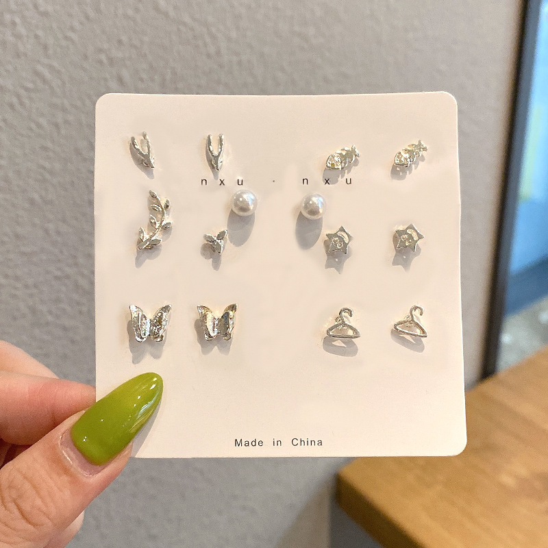 Conjunto de aretes de estilo ins 2024 nuevos aretes de moda pendientes de mujer, estilo de moda, temperamento dulce y versátil, abanico de diosa