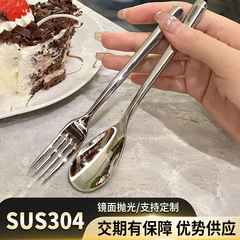 高級304ステンレスの厚いデザートのスプーンとフォークの軽い豪華なホテルのフランスの月光の長い柄の果物のコーヒーのスプーン
