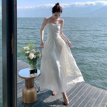 超仙白色露背连衣裙高级感女夏季新款吊带裙子设计感小众仙女长裙