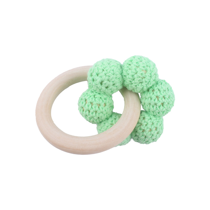 Nuevo bebé suministros Hemu teether pulsera bebé cuentas de lana flor juguete dientes molienda palo AliExpress