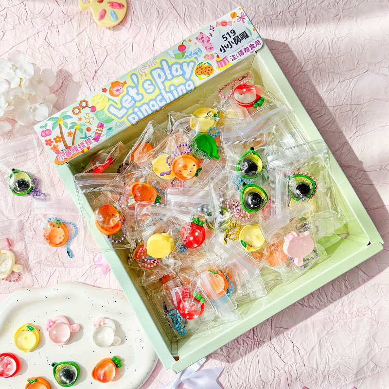 Ocean Pellizcar colgante Pellizcar juguete de descompresión Pellizcar juguete Pellizcar 24 cajas de color Pellizcar artefacto de descompresión