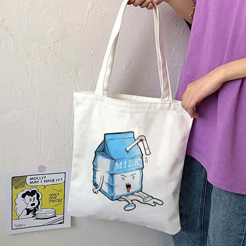 2025亚马逊跨境wish爆款新款卡通牛奶印花帆布手提袋白色印花图案