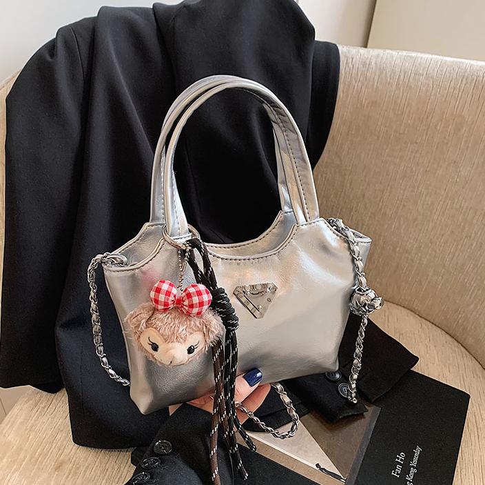 Bolso de mano explosivo transfronterizo para mujeres 2025 primavera nueva cadena de bolso de hombro universal de alta calidad bolso de cubo de agua