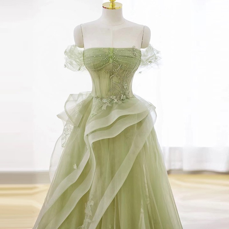 Vestido de noche verde de pecho 2026 verano nuevo anfitrión del anfitrión del anfitrión del anfitrión de graduación