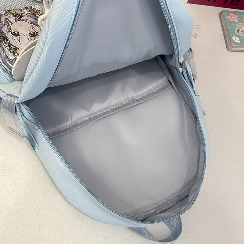 Mochila de estudiantes de secundaria, mochila de niñas de secundaria, mochila de ocio, mochila de grano, mochila de dolor.