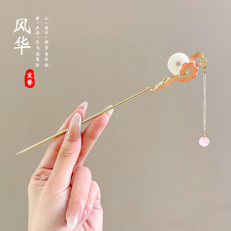 1 horquilla con borlas de flores de melocotón