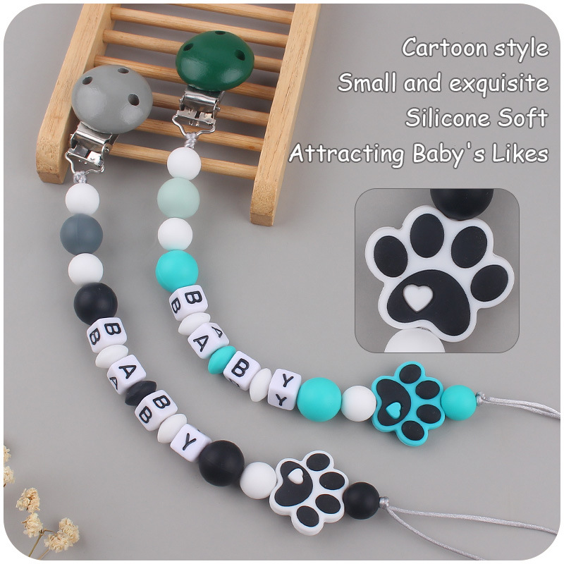 Nuevo bebé suministros de dibujos animados perro garra silicona mordedor creativo bebé DIY mordedura molar pezón cadena anti-caída