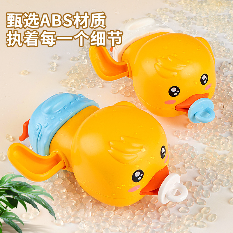 Wind-up toy play in water, yellow duck, swimming pool, frog 3
