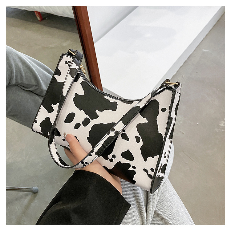 Bolsos de mano de vaca bajo las axilas bolsas de mano bolsas de mujer 2026 nueva moda francesa bolsas de hombro