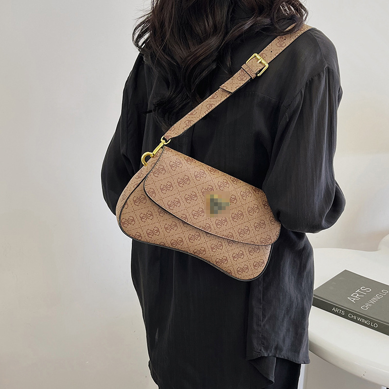 Bolsos transfronterizos para mujer 2024 nuevo estilo de alta gama bolso de axila de lujo simple y ligero con estampado de diamantes bolso de mensajero de todo fósforo