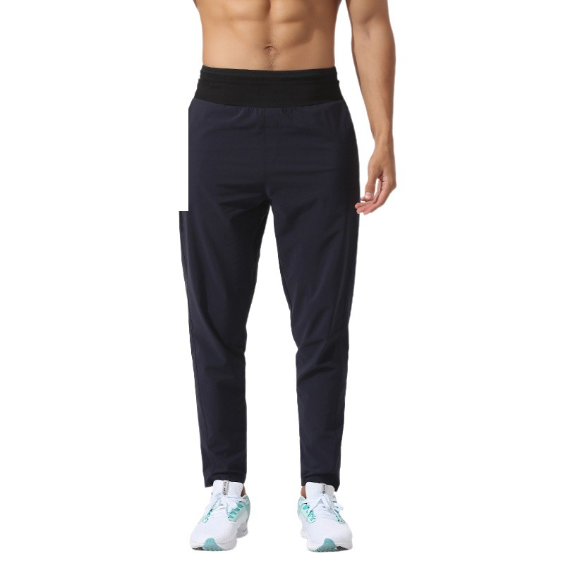 Pantalones deportivos de los hombres de otoño e invierno nuevo de larga distancia maratón de entrenamiento multi-funcional bolsa de cintura impermeable de bolsillo pantalones de secado rápido