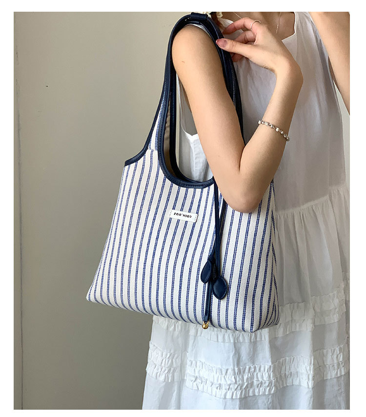 2025 Casual Commuter Tote bag, women's niche striped simple and fashionable hand-held shoulder bag, large-capacity underarm bag undefined