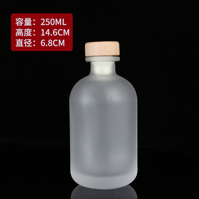 Botella de vidrio esmerilado transparente al por mayor botella de vino de fruta casera de cerveza botella de vino vacía botella de vodka botella de vino de ciruela cubierta de madera