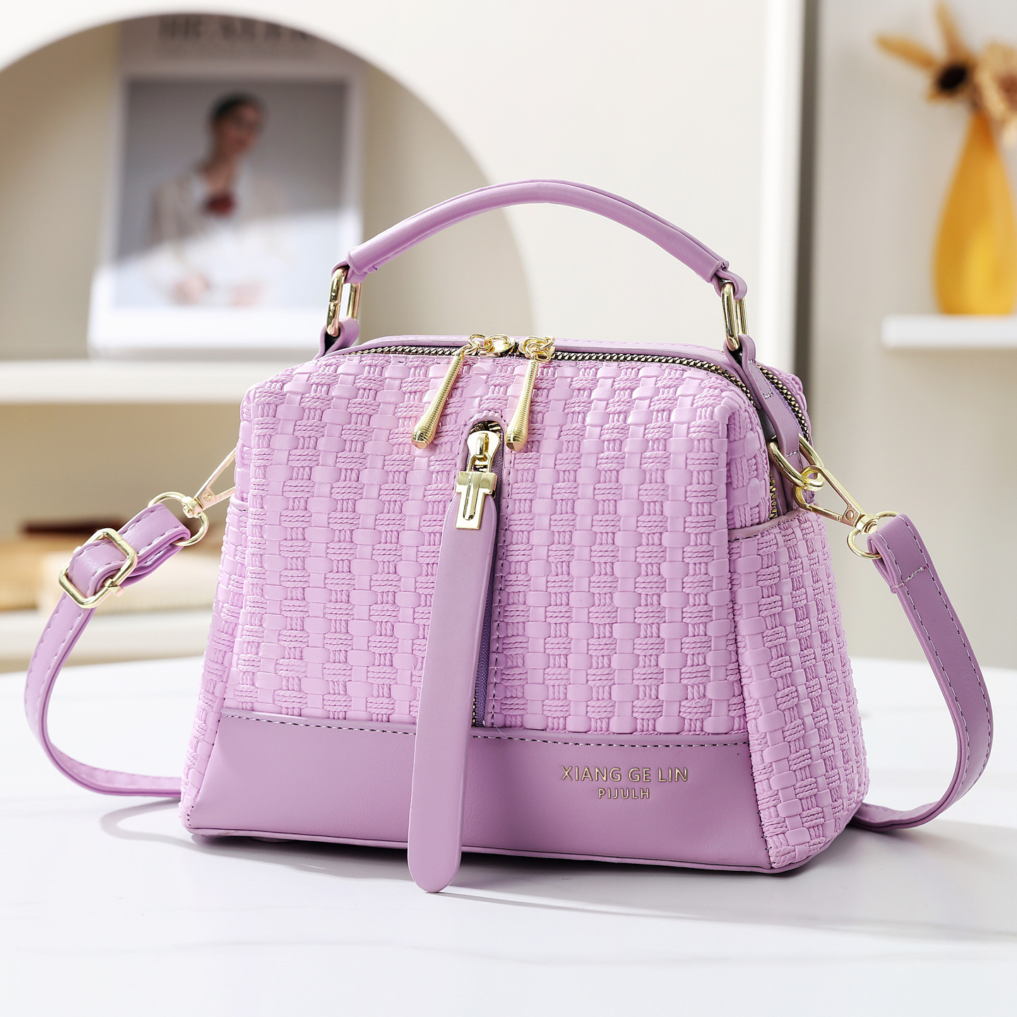 2026 nuevo temperamento de moda tejido bolso de mano textura casual mochila de hombro de gran capacidad bolso de viaje