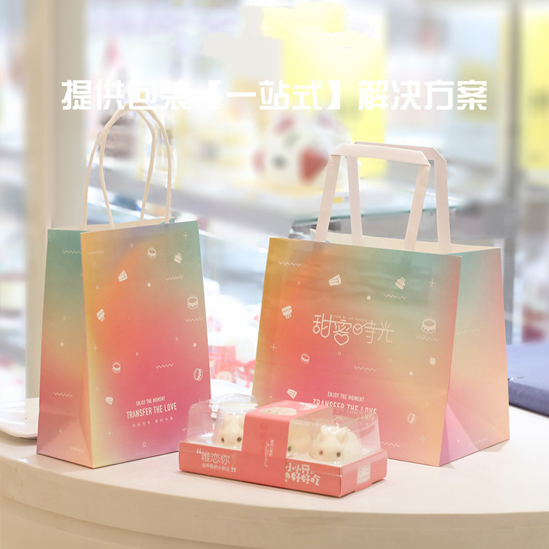 粉色渐变手提牛皮纸袋服装礼品鞋帽四面印logo手提牛皮纸袋厂家