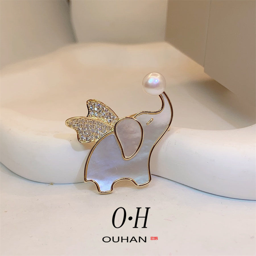 Fritillaria natural Flying elefante broche broche japonesas y coreanas adorables animales broche de ropa accesorios de venta caliente