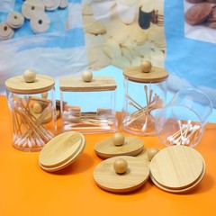 使い捨ての工夫の杯の棚の竹の蓋の綿棒の缶の化粧綿の収納箱の竹の蓋のアクリルの缶の丸いボールの竹の蓋