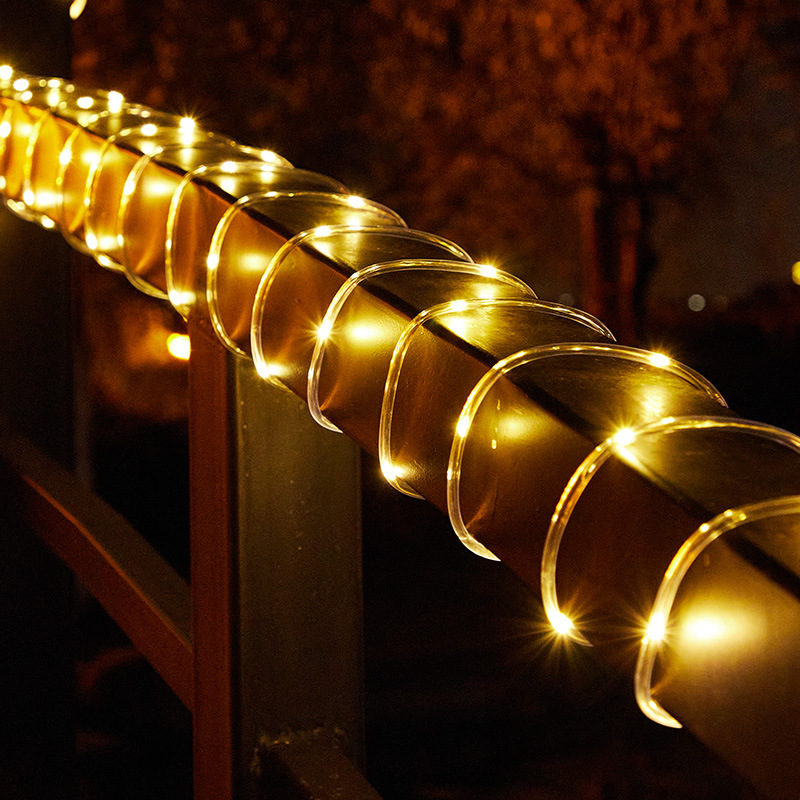 En stock suministro de luz de tubo solar Cadena de iluminación con control remoto manguera de PVC lámpara de alambre de cobre Patio de Navidad luz decorativa