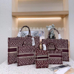高版D家の新型のトートの女性のカバンの高級感のアルファベットの刺繍の戴妃のカバンのハンドバッグは欧米の大容量になります。