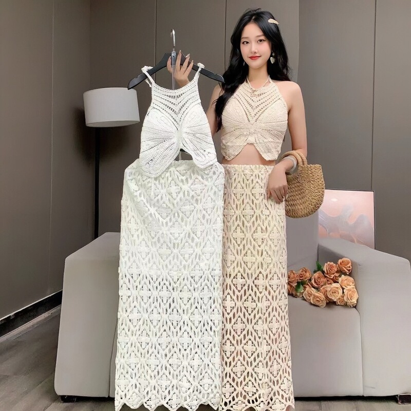 Beach vacation fashion bohemian style mesh crochet knitted lace-up tank top and mid-length skirt two-piece set for women