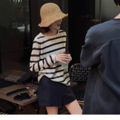 韓国風白黒コントラストストライプ薄手通気性テンセルニットセーター女性用春秋新作長袖Tシャツトップス流行