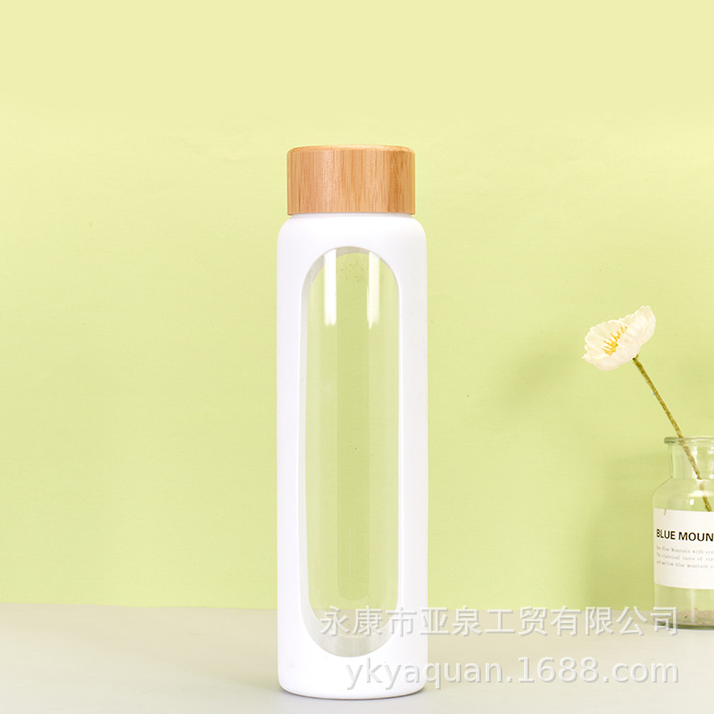 Cubierta de bambú transfronteriza de vidrio aislado de gran capacidad de una sola capa de vidrio de borosilicato taza de agua con taza de silicona cubierta protectora al por mayor