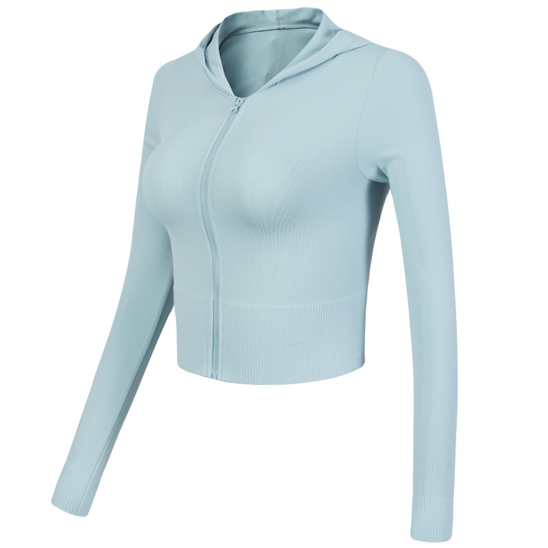 Abrigo de yoga Otoño e Invierno nueva ropa de entrenamiento ajustada elástica de secado rápido de manga larga con capucha superior deportiva para mujeres