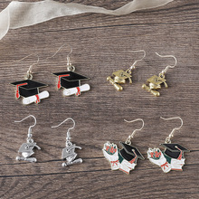 欧美跨境时尚毕业季花朵耳环女 个性创意捧花滴油学士帽彩色耳饰