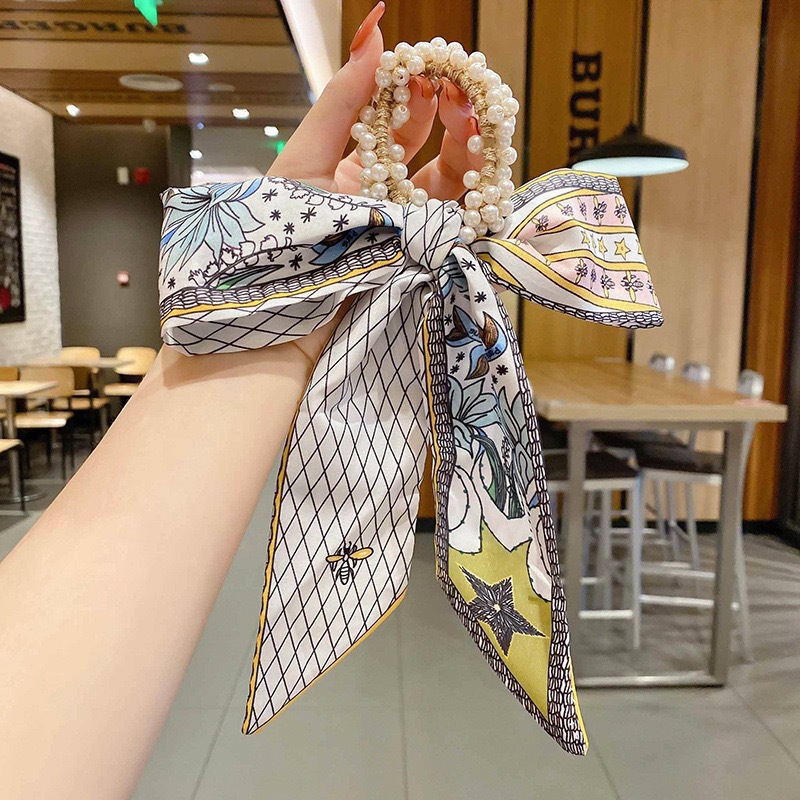 Banda de pelo de bufanda de seda para mujer corbata de pelo fino de verano de perlas cinta de arco Hada cuerda de pelo de todo fósforo estilo coreano accesorios para el cabello al por mayor