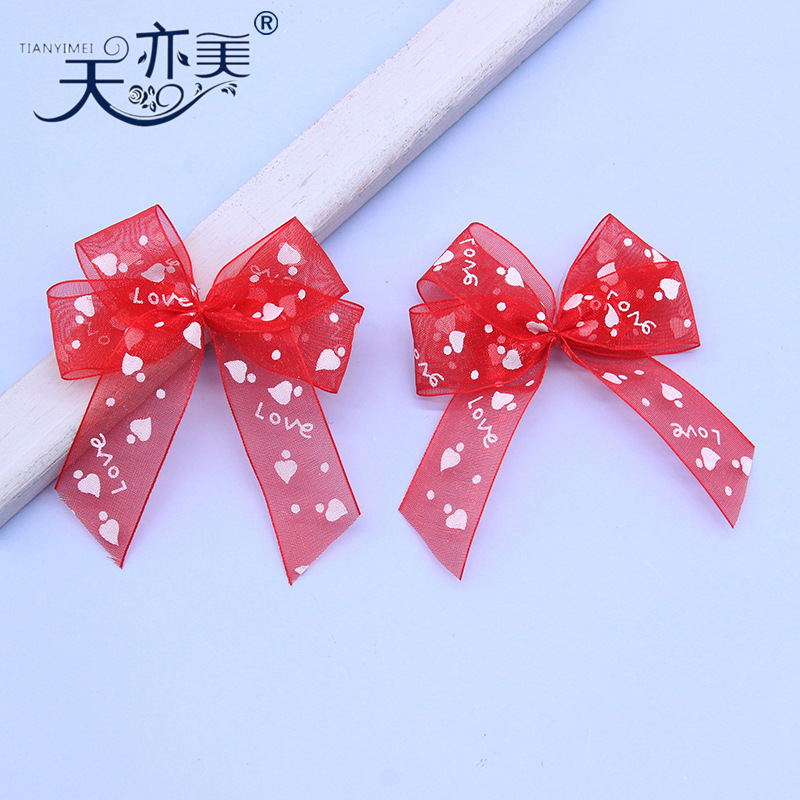 Tianyimei lote procesamiento rojo cinta arco 2,5 cm hilado con arco de regalo de corazón de melocotón impreso