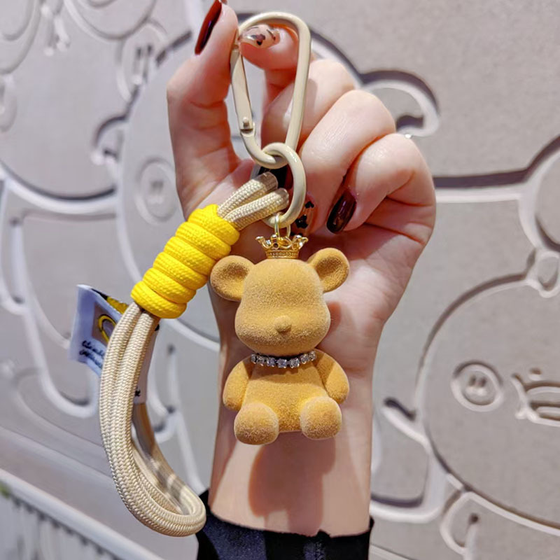 Nuevo cartón de dibujos animados flocado corona violenta oso llavero colgante pareja muñeca bolso colgante teléfono móvil pequeño regalo
