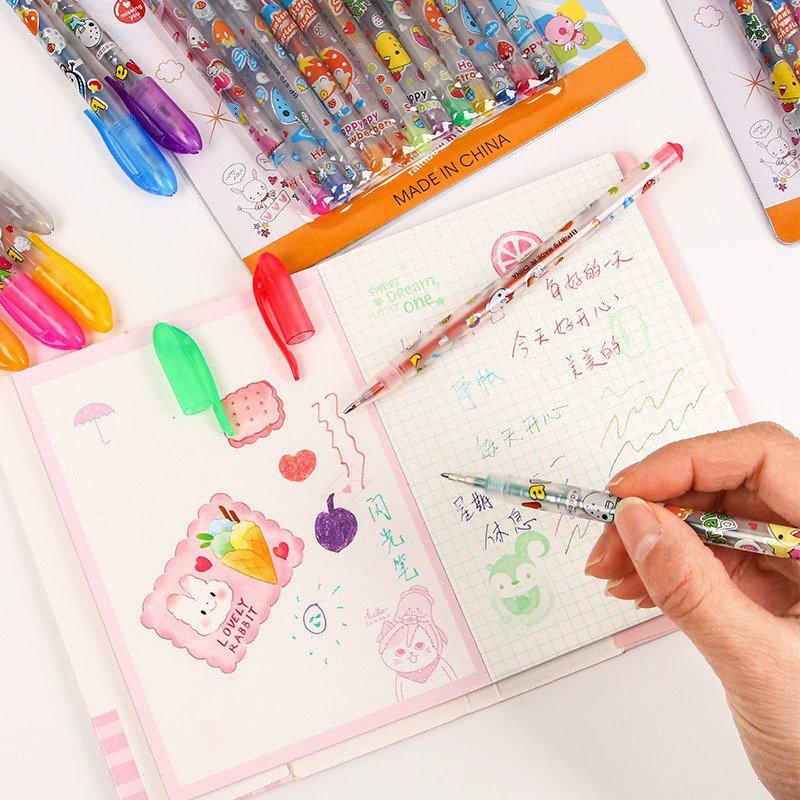 Flashing fluorescence highlighter, coloured pencils, rollerball pen, scheduler