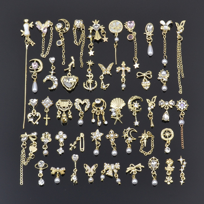Golden accessory for manicure with bow