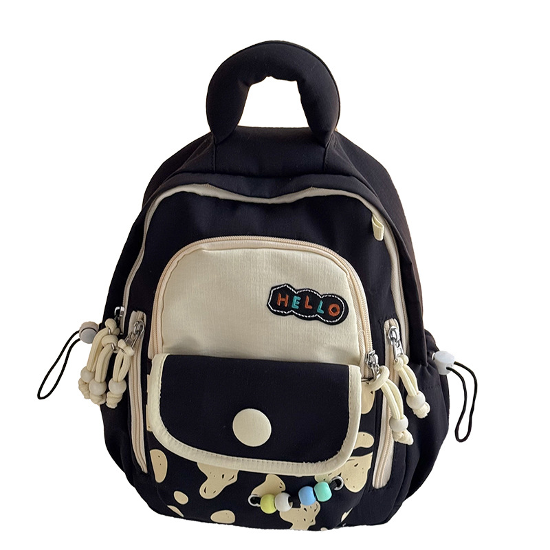 Mochila infantil coreana, estilo de color contrastante, mochila de estudiantes de impresión de aire extranjero, 2026 nueva mochila transfronteriza para niños y niñas
