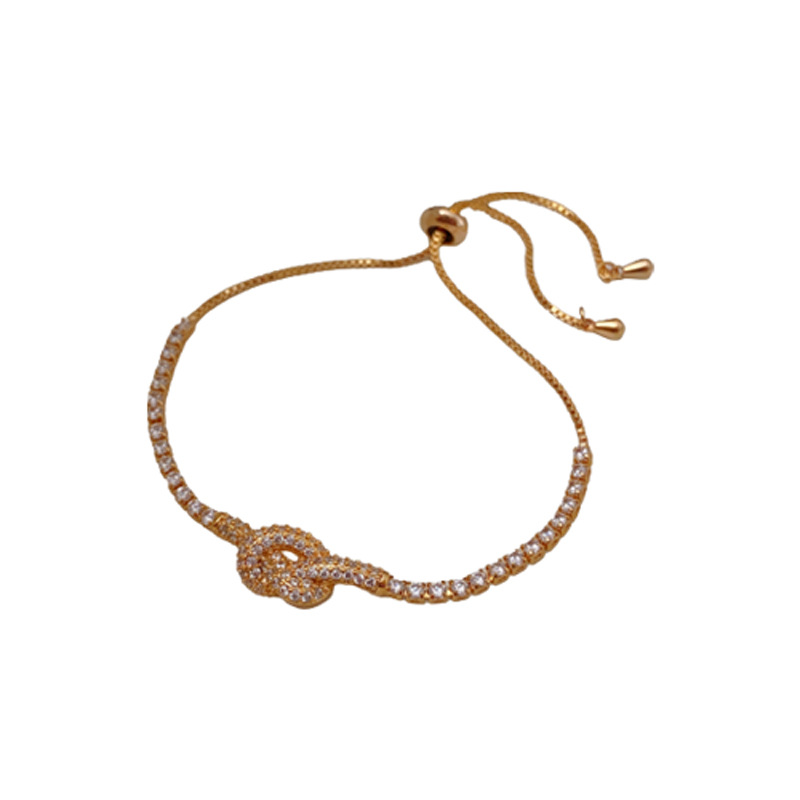 Real oro galvanizado ZIRCON anudada pulsera hueco simple pulsera elegante luz lujo alto sentido pulsera para las mujeres al por mayor