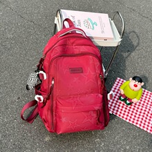 初中生书包女双肩包韩版星星印花高中学生大容量休闲简约轻便背包