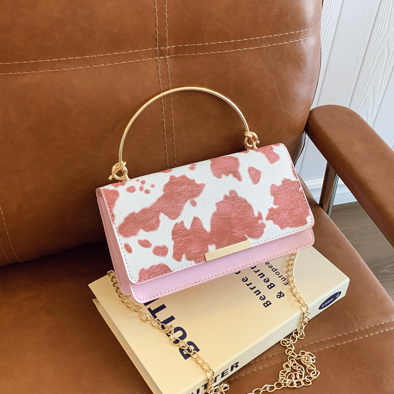 Moda coreana hermosa bolsa de mensajero occidental mujer 2025 nuevo diseño de nicho bolso de viaje personalizado todo-fósforo