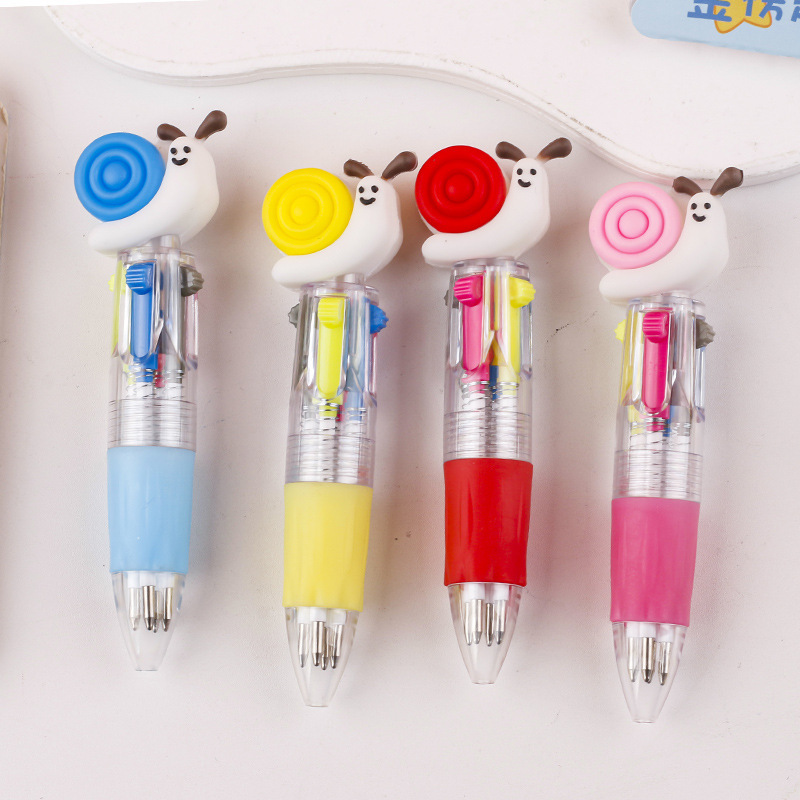 Fabricante mayorista de cuatro colores bolígrafo de silicona bolígrafo multicolor de dibujos animados cabeza portátil de estudiantes