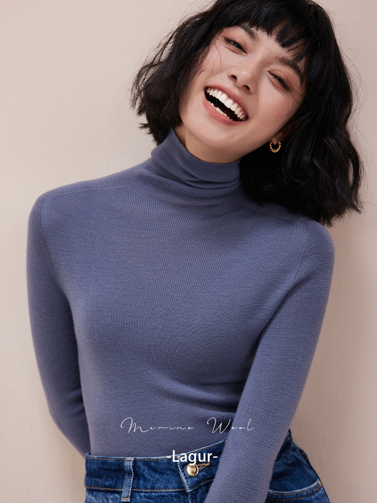 トップスは新年の赤色、シームレスな一体型揚子紡績100％ウールニット、女性用スリムフィットハイネックセーター