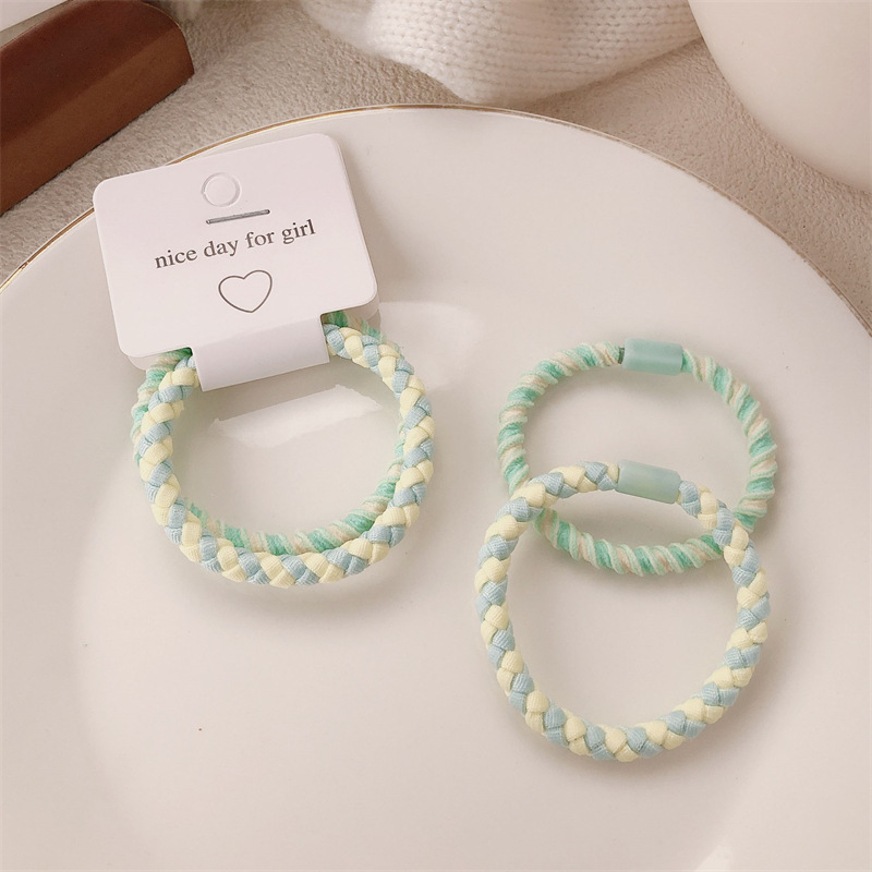 A principios de la primavera nueva cuerda de cabeza de color caramelo anillo de cabello coreano de niña de alta elasticidad universal cola de caballo cuerda de cabello adornamiento para el cabello