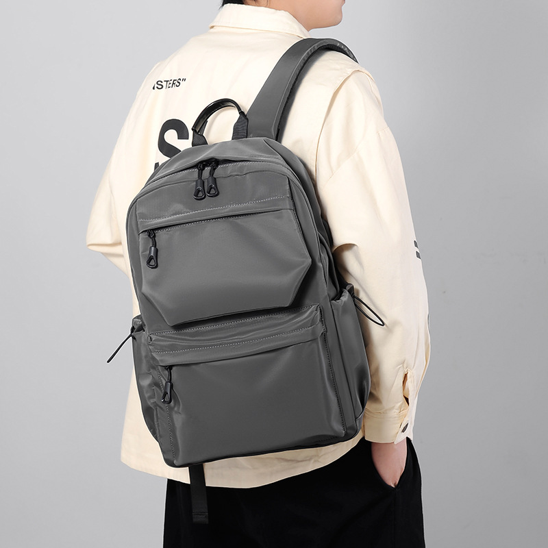 Muestra de viaje de hombre bolsas de computadora casuales de doble espalda moda coreana de estudiantes mochila de viaje mochila al por mayor