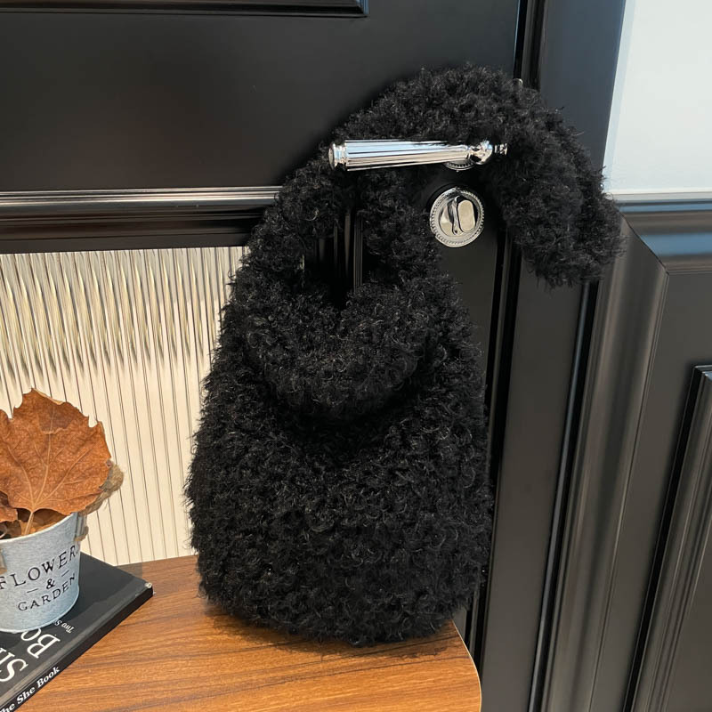 Nicho original de otoño y invierno bolsas de peluche vagabundos bolsas de hombro de chicas calientes de aire exterior rizado retro bolsas de moda