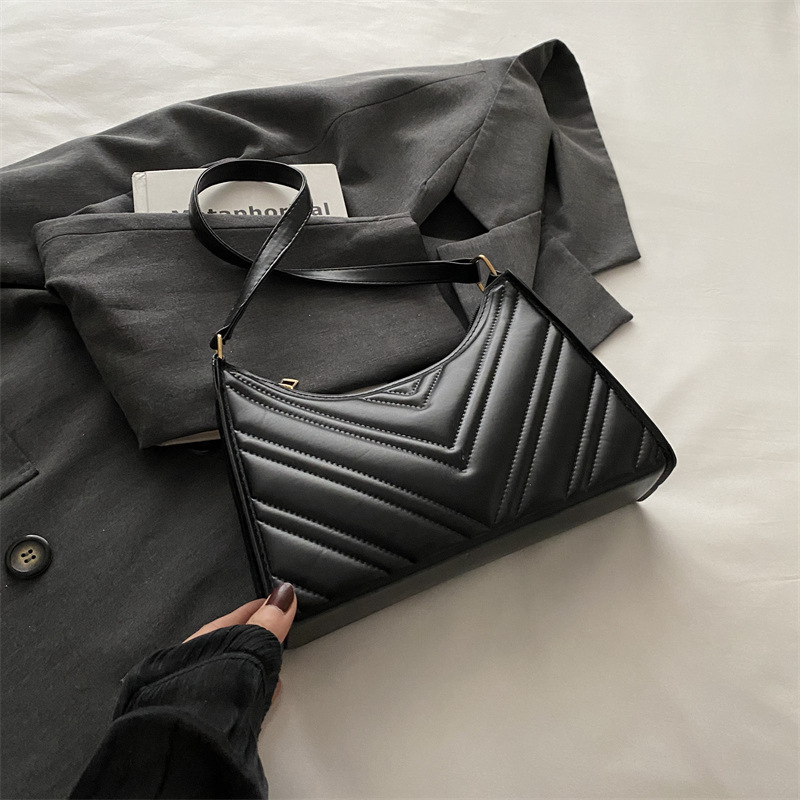 Nicho francés diseño bolso de brazaletes de diamante para mujeres 2024 verano nuevo estilo de moda de cadena universal bolso de hombro para chicas