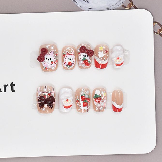 10 piezas de dibujos animados rojos manicure para usar piezas de uñas productos terminados al por mayor corto arco de Año Nuevo lindo piezas de manicure