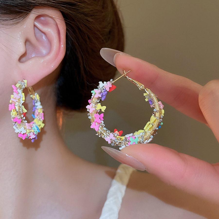 Pendientes de flores de color dopamina de verano Pendientes de todo fósforo de nicho fresco Pendientes de lujo de alta gama de moda al por mayor