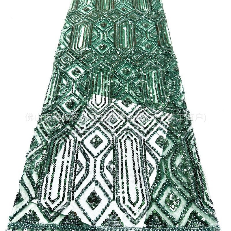 Oriente Medio Gaoding industria pesada bordada tela de brindis ropa de tela fábrica de venta directa de alta gama sequinilla bordada tela