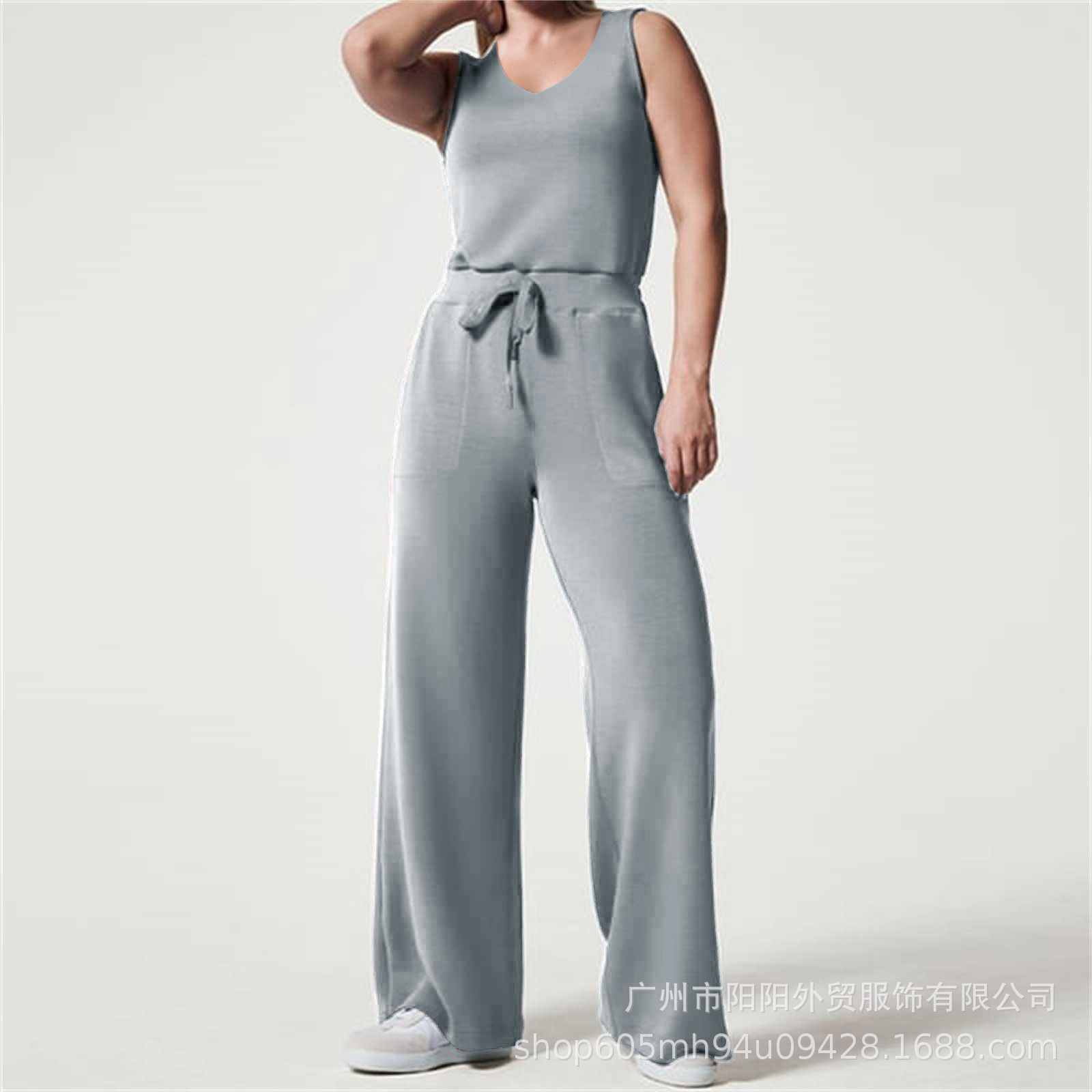 2023 primavera y verano nuevo versátil moda europea y americana adelgazamiento ocasional de las mujeres sin mangas color sólido V-cuello pantalones jumpsuit