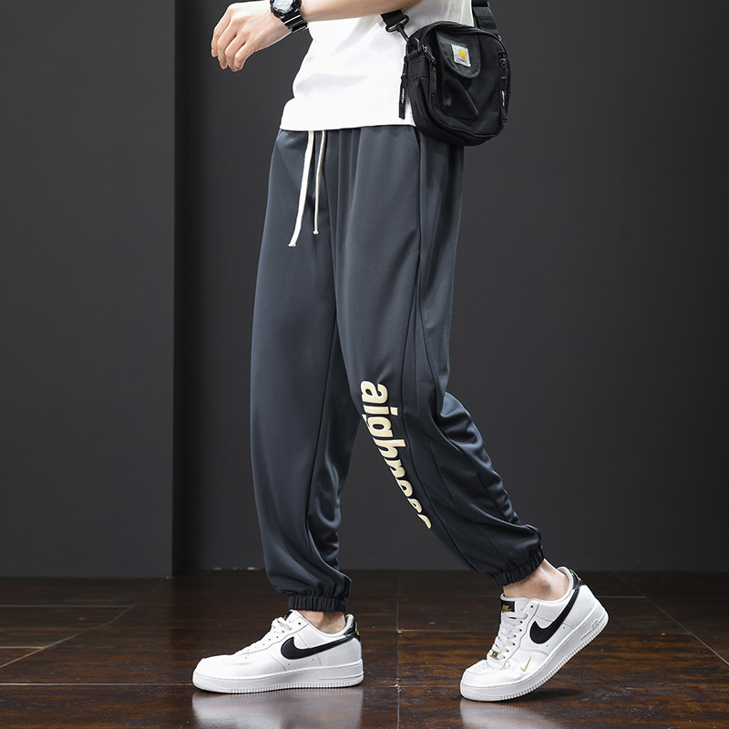 Pantalones pesados de estilo americano para hombres primavera y otoño marca de moda, pantalones juveniles, pantalones deportivos casuales largos sueltos