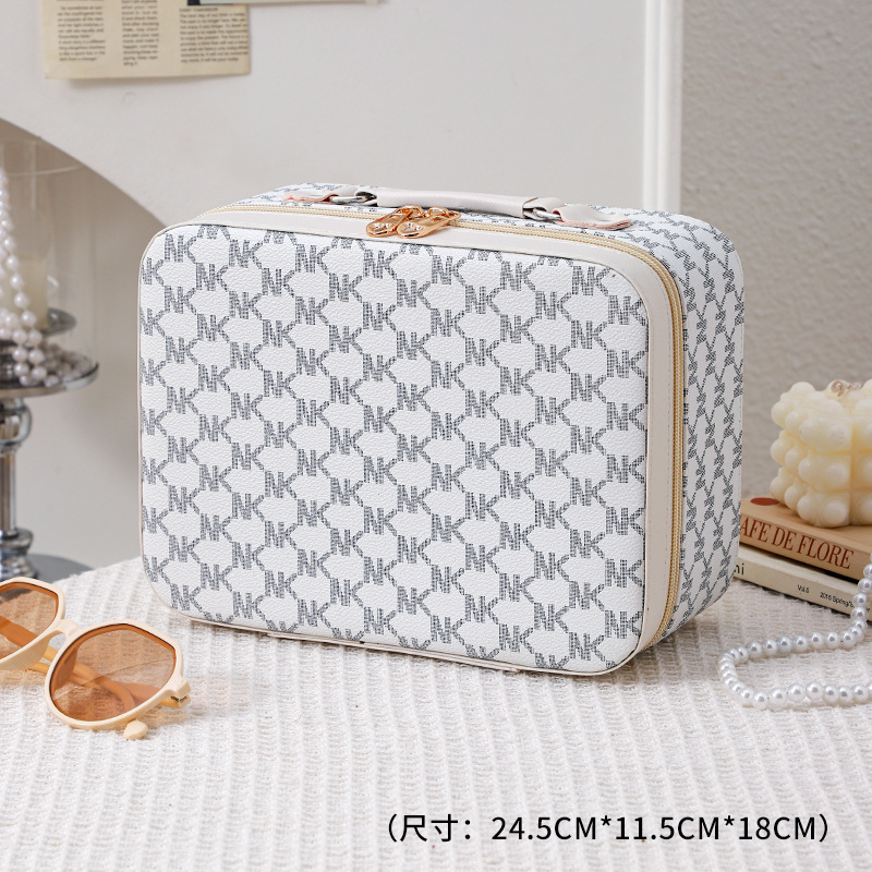 Bolsa de cosméticos de cuero caja de almacenamiento de gran capacidad para mujeres caja de cosméticos Portátil Bolsa de almacenamiento de cosméticos de alta apariencia al por mayor