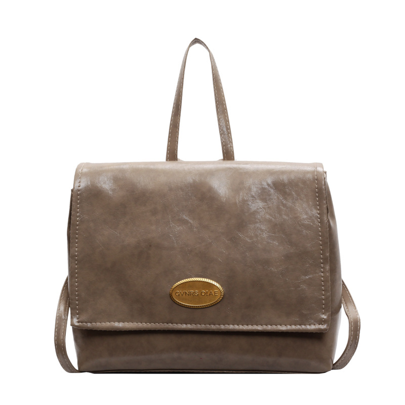 Mochila coreana retro de estilo universitario 2024 invierno nuevo simple de gran capacidad de mano mochila de hombro para viajar